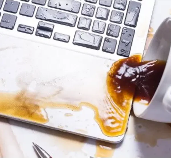 Spilled coffee on laptop keyboard 600x553